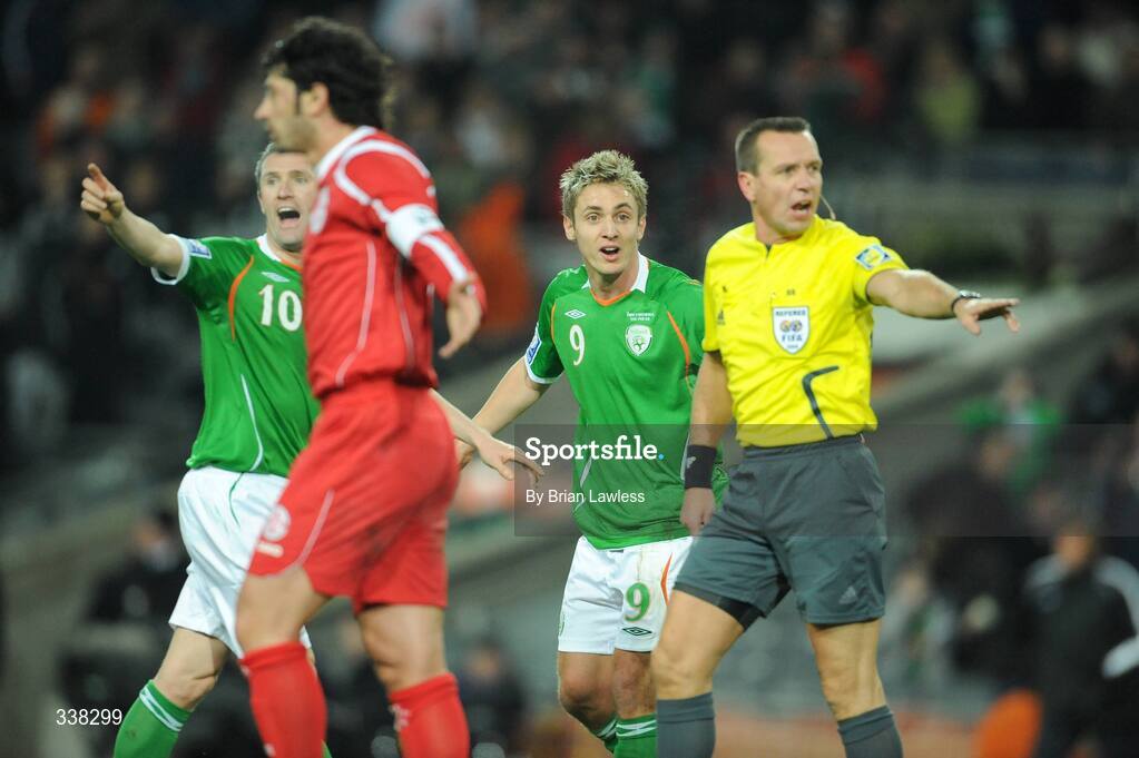 11 February 2009; Republic of Ireland players Robbie Keane, left, and Kevin Doyle, reomonstrate with referee Jouni Hyytia, after he had disallowed a goal by team-mate Keith Andrews. 2010 FIFA World Cup Qualifier, Republic of Ireland v Georgia, Croke Park, Dublin. Picture credit: Brian Lawless / SPORTSFILE