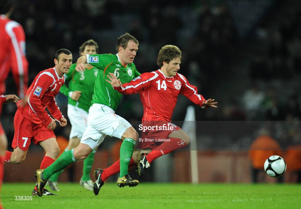 11 February 2009; Beka Gotsiridze, Georgia, in action against Glenn Whelan, Republic of Ireland. 2010 FIFA World Cup Qualifier, Republic of Ireland v Georgia, Croke Park, Dublin. Picture credit: Brian Lawless / SPORTSFILE