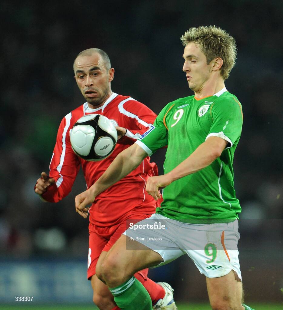11 February 2009; Kevin Doyle, Republic of Ireland, in action against Zurab Menteshashvili, Georgia. 2010 FIFA World Cup Qualifier, Republic of Ireland v Georgia, Croke Park, Dublin. Picture credit: Brian Lawless / SPORTSFILE