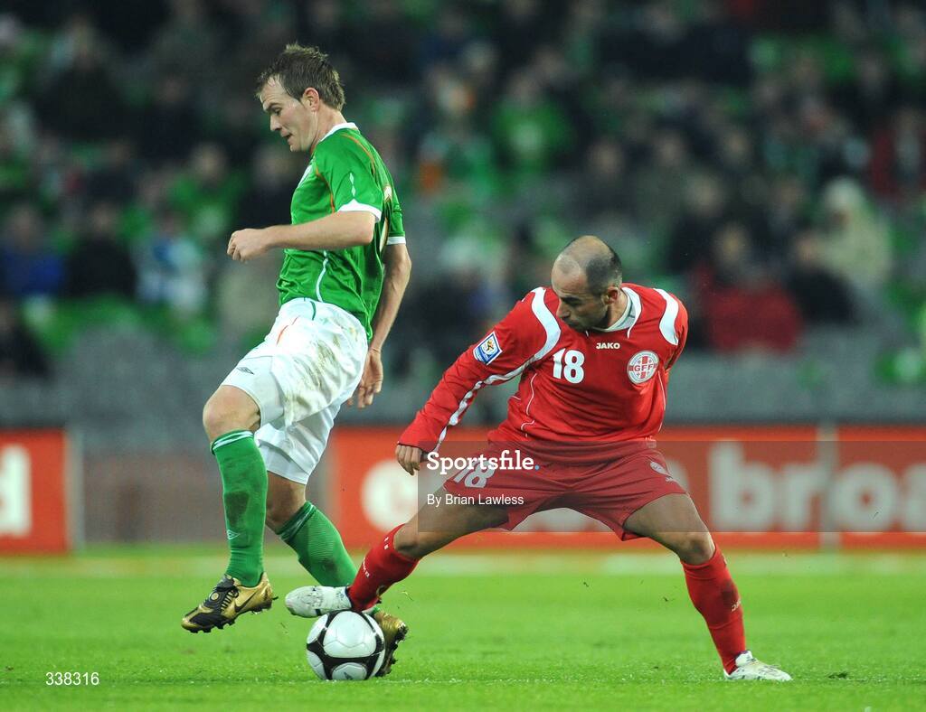 11 February 2009; Glenn Whelan, Republic of Ireland, in action against Zurab Menteshashvilli, Georgia. 2010 FIFA World Cup Qualifier, Republic of Ireland v Georgia, Croke Park, Dublin. Picture credit: Brian Lawless / SPORTSFILE