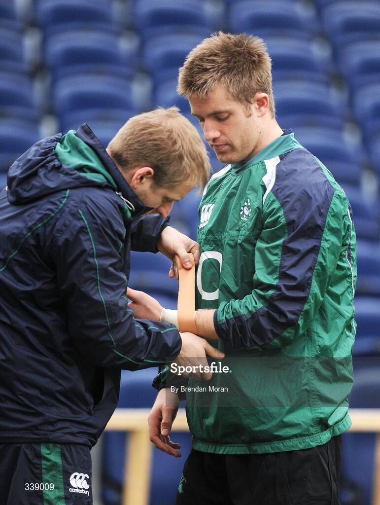 24 February 2009; Luke Fitzgerald is strapped up by team physio Brian Green during Ireland rugby squad training ahead of their RBS Six Nations game against England on Saturday. RDS, Dublin. Picture credit: Brendan Moran / SPORTSFILE