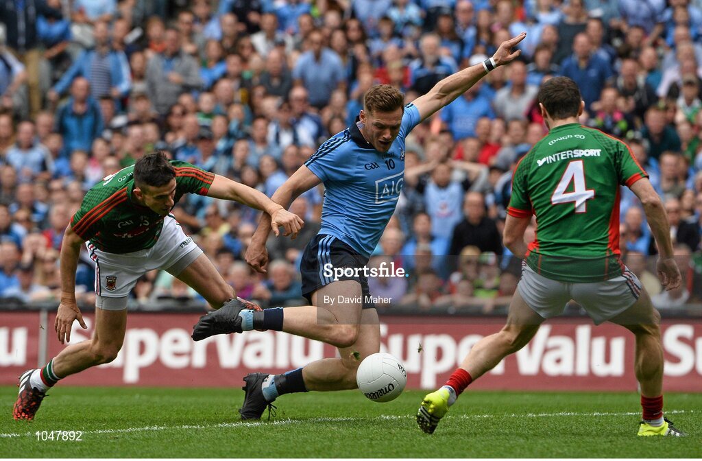 30 August 2015; Paul Flynn, Dublin, is tackled by Jason Doherty, Mayo, resulting in a penalty being awarded by referee Joe McQuillan. GAA Football All-Ireland Senior Championship, Semi-Final, Dublin v Mayo, Croke Park, Dublin. Picture credit: David Maher / SPORTSFILE