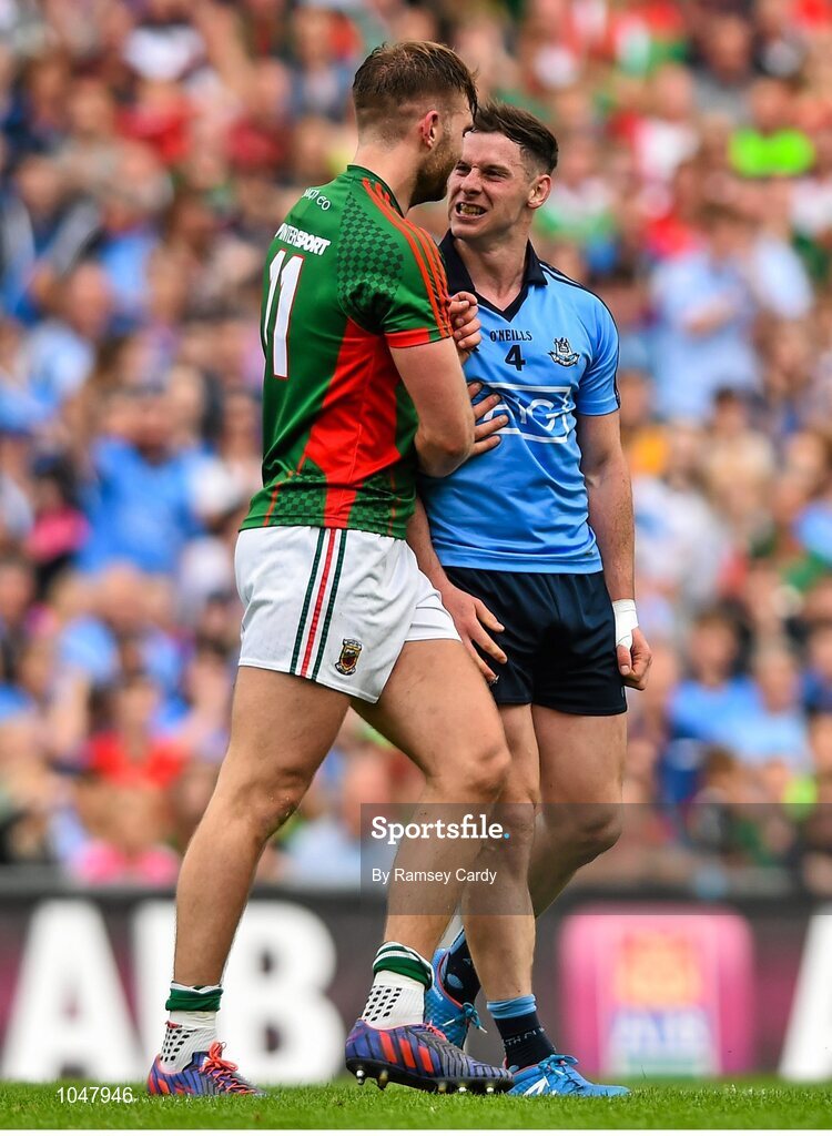 30 August 2015; Philly McMahon, Dublin, tussles with Aidan O'Shea, Mayo. GAA Football All-Ireland Senior Championship, Semi-Final, Dublin v Mayo, Croke Park, Dublin. Picture credit: Ramsey Cardy / SPORTSFILE