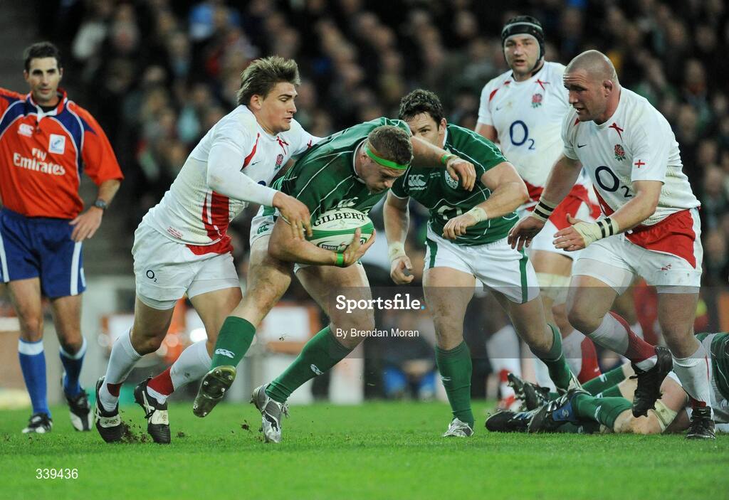 28 February 2009; Jamie Heaslip, Ireland, is tackled by Toby Flood, left, and Phil Vickery, England. RBS Six Nations Rugby Championship, Ireland v England, Croke Park, Dublin. Picture credit: Brendan Moran / SPORTSFILE