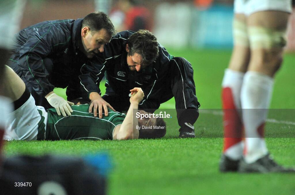 28 February 2009; Ireland captain Brian O'Driscoll is attended to by team physio Cameron Steele, right, and team doctor Dr. Michael Webb. RBS Six Nations Rugby Championship, Ireland v England, Croke Park, Dublin. Picture credit: David Maher / SPORTSFILE