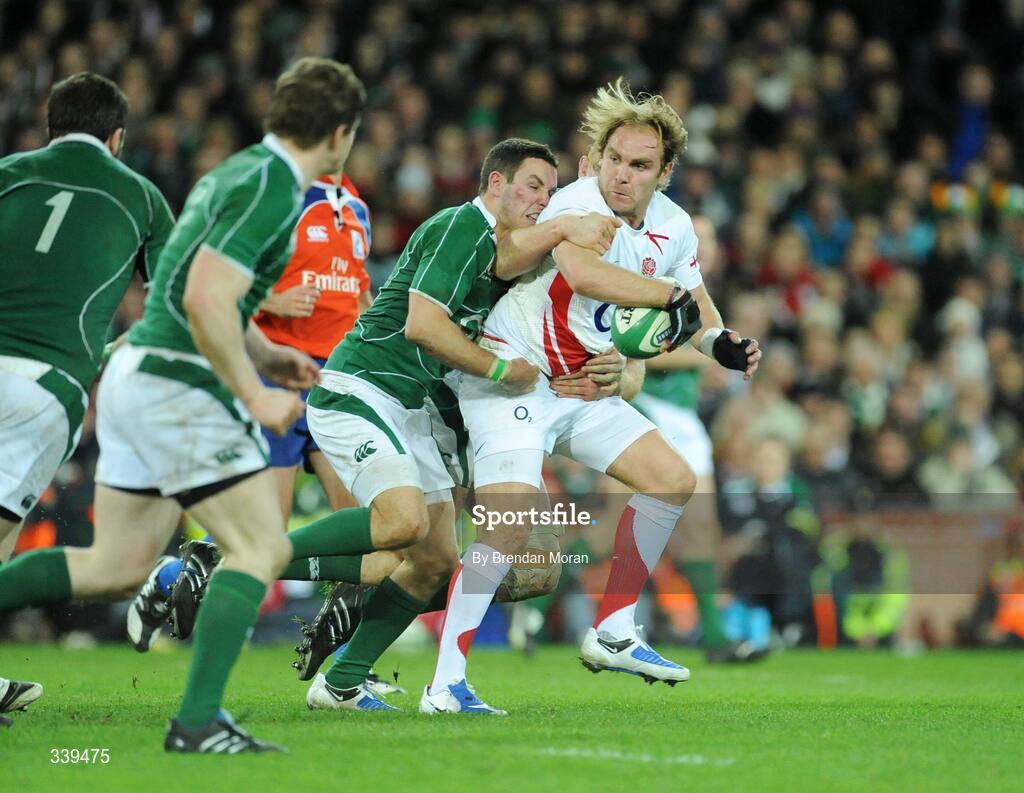 28 February 2009; Andy Goode, England, is tackled by Paddy Wallace, Ireland. RBS Six Nations Rugby Championship, Ireland v England, Croke Park, Dublin. Picture credit: Brendan Moran / SPORTSFILE