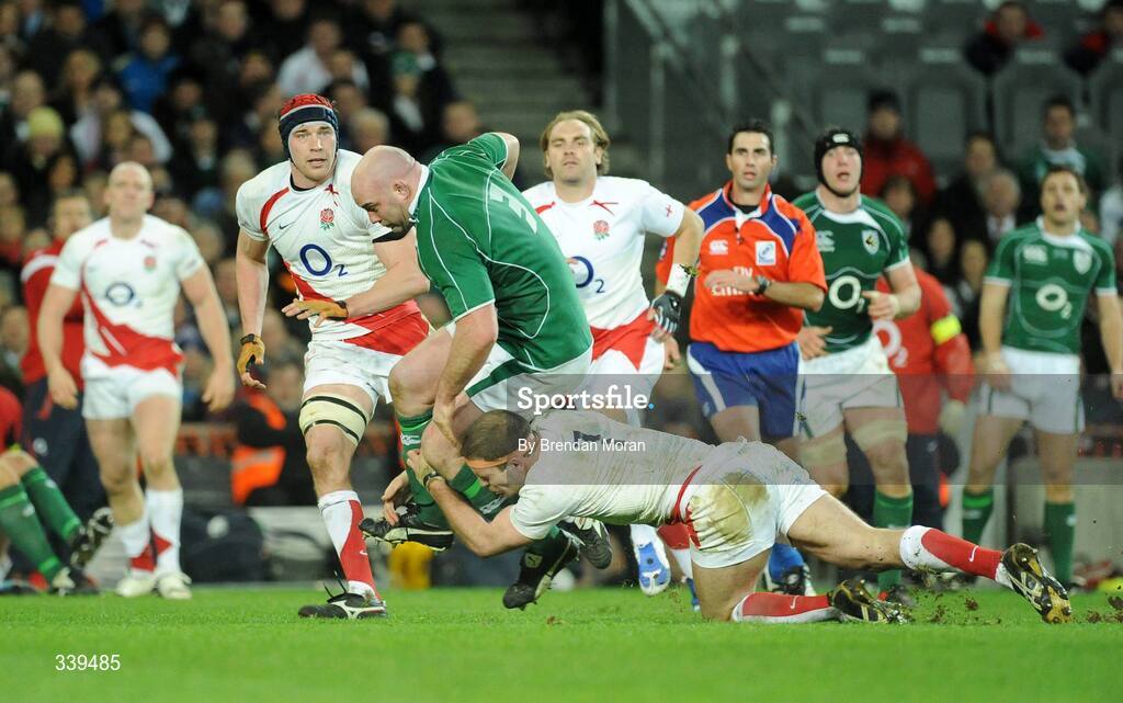 28 February 2009; John Hayes, Ireland, is tackled by Joe Worsley, England. RBS Six Nations Rugby Championship, Ireland v England, Croke Park, Dublin. Picture credit: Brendan Moran / SPORTSFILE