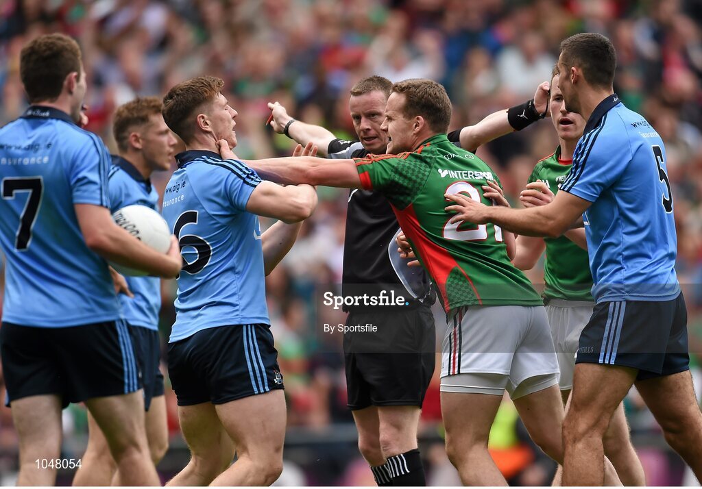 30 August 2015; John Small, Dublin, gets involved in an altercation with Andy Moran, Mayo, as referee Joe McQuillan signals for a penalty for Mayo. GAA Football All-Ireland Senior Championship, Semi-Final, Dublin v Mayo, Croke Park, Dublin. Photo by Sportsfile