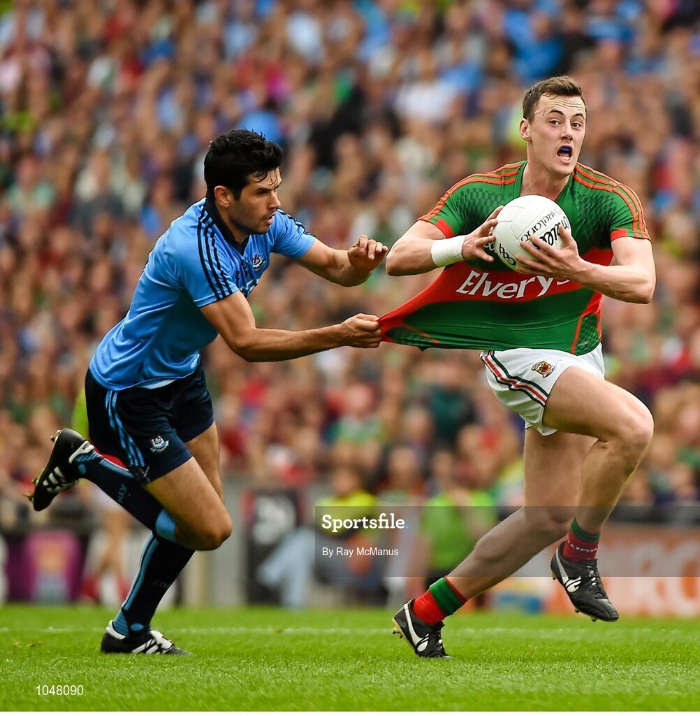 30 August 2015; Diarmuid O'Connor, Mayo, is tackled by Cian O'Sullivan, Dublin. GAA Football All-Ireland Senior Championship, Semi-Final, Dublin v Mayo, Croke Park, Dublin. Picture credit: Ray McManus / SPORTSFILE