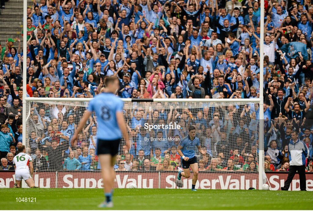 30 August 2015; Dublin supporters cheer as Diarmuid Connolly celebrates after scoring his side's first goal from a penalty. GAA Football All-Ireland Senior Championship, Semi-Final, Dublin v Mayo, Croke Park, Dublin. Picture credit: Brendan Moran / SPORTSFILE