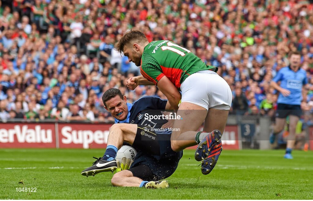 30 August 2015; Stephen Cluxton, Dublin, is tackled by Aidan O'Shea, Mayo. GAA Football All-Ireland Senior Championship, Semi-Final, Dublin v Mayo, Croke Park, Dublin. Picture credit: Brendan Moran / SPORTSFILE