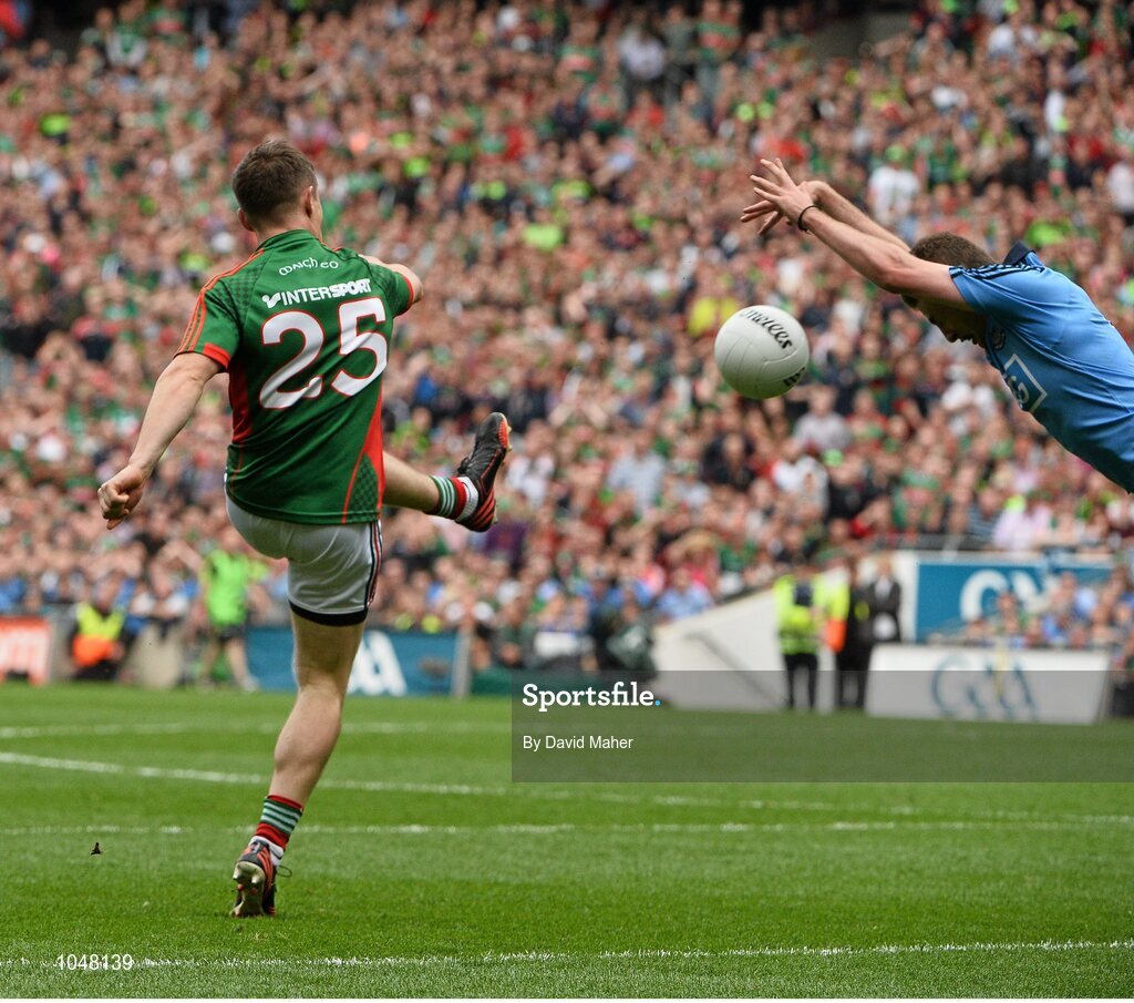 30 August 2015; Mickey Sweeney, Mayo, has his shot blocked down by Jack McCaffrey, Dublin, late in the game. GAA Football All-Ireland Senior Championship, Semi-Final, Dublin v Mayo, Croke Park, Dublin. Picture credit: David Maher / SPORTSFILE