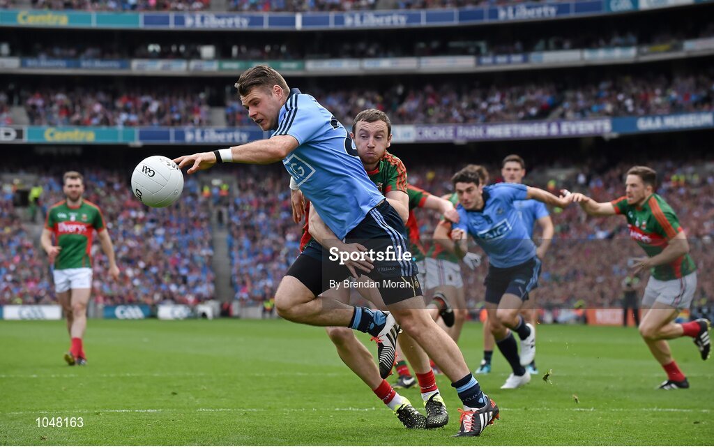 30 August 2015; Kevin McManamon, Dublin, is tackled by Keith Higgins, Mayo. GAA Football All-Ireland Senior Championship, Semi-Final, Dublin v Mayo, Croke Park, Dublin. Picture credit: Brendan Moran / SPORTSFILE