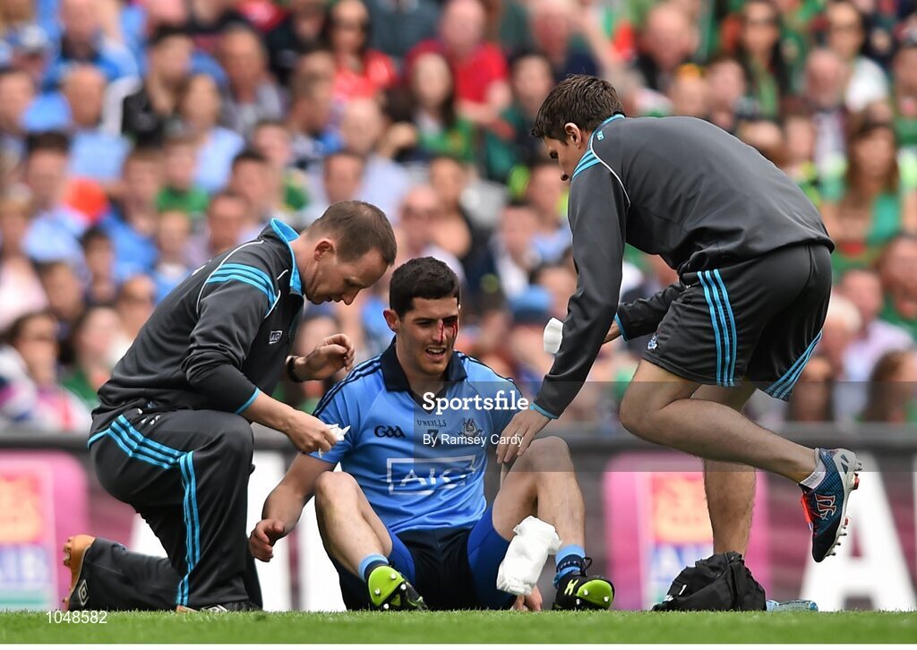 30 August 2015; Rory O'Carroll, Dublin, is treated for a head injury. GAA Football All-Ireland Senior Championship, Semi-Final, Dublin v Mayo, Croke Park, Dublin. Picture credit: Ramsey Cardy / SPORTSFILE