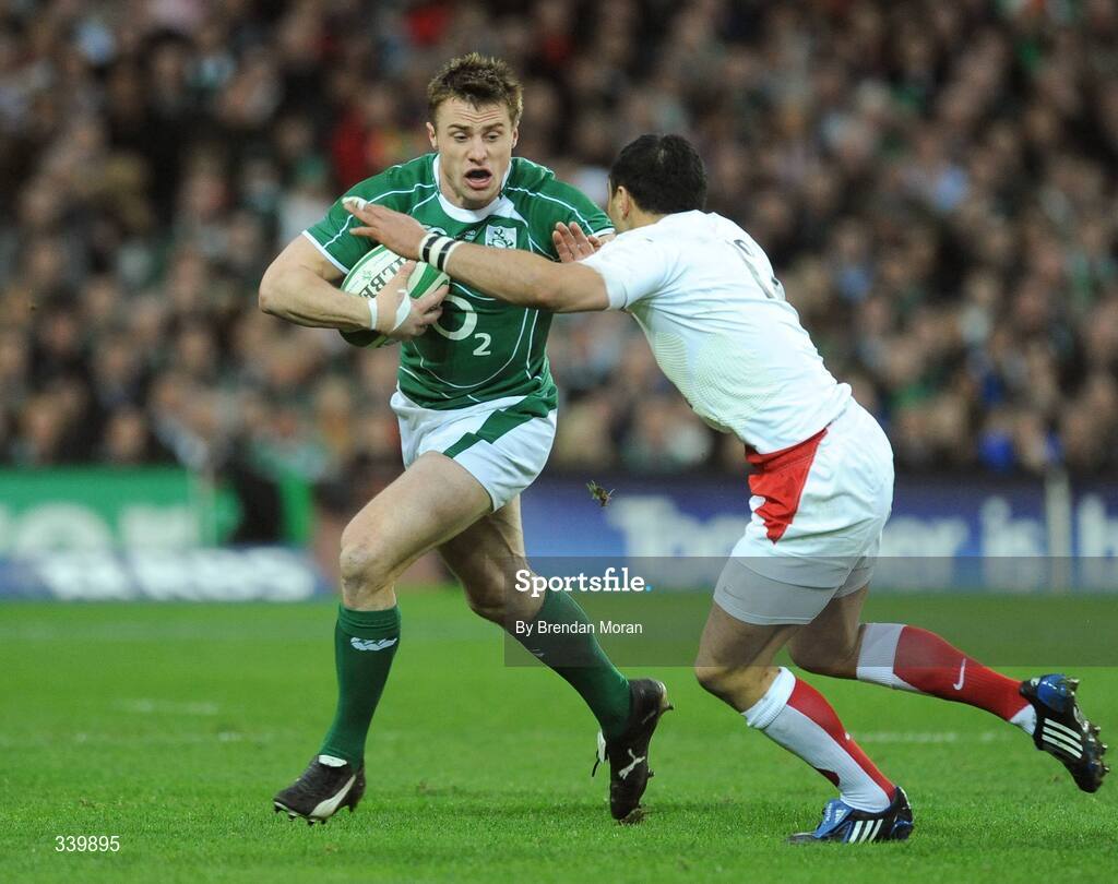 28 February 2009; Tommy Bowe, Ireland, breaks the tackle of Riki Flutey, England. RBS Six Nations Rugby Championship, Ireland v England, Croke Park, Dublin. Picture credit: Brendan Moran / SPORTSFILE