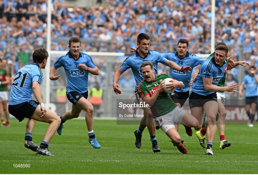 30 August 2015; Andy Moran, Mayo, in action against  Dublin players from left, Michael Fitzsmions, Jack McCaffrey, Eric Lowndes, Kevin McManamon and John Small. GAA Football All-Ireland Senior Championship, Semi-Final, Dublin v Mayo, Croke Park, Dublin. Picture credit: David Maher / SPORTSFILE