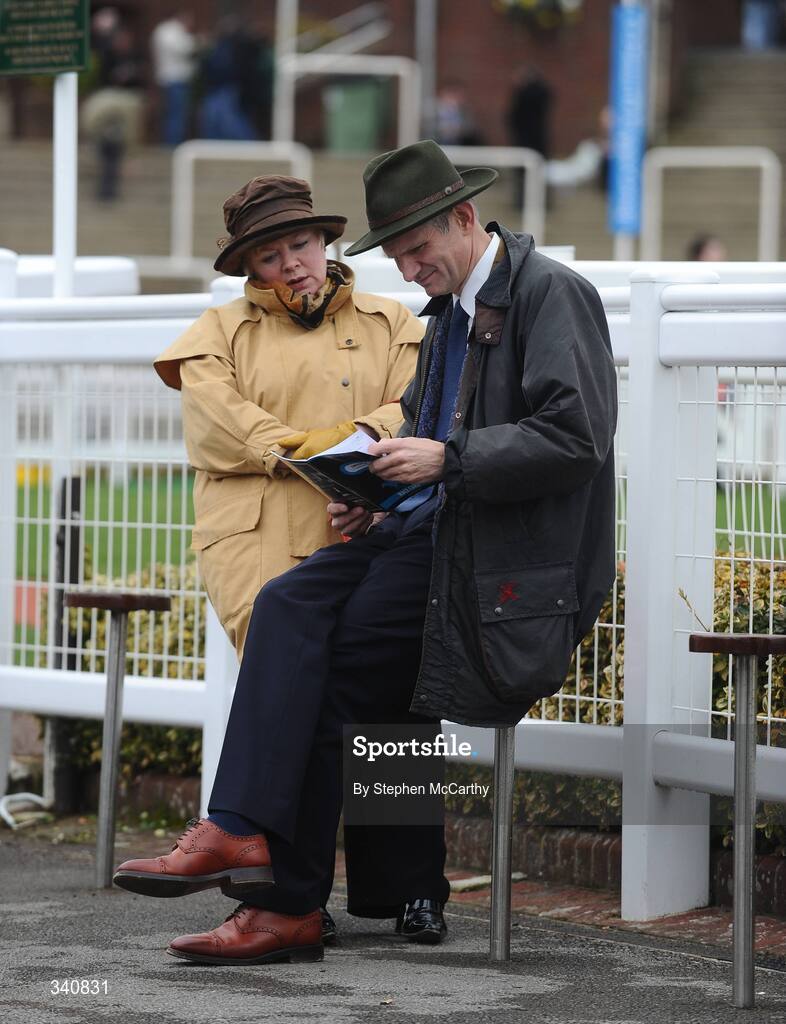 10 March 2009; Punters examine their race cards ahead of the opening day of the Cheltenham Racing Festival 2009. Cheltenham Racing Festival - Tuesday, Prestbury Park, Cheltenham, Gloucestershire, England. Picture credit: Stephen McCarthy / SPORTSFILE