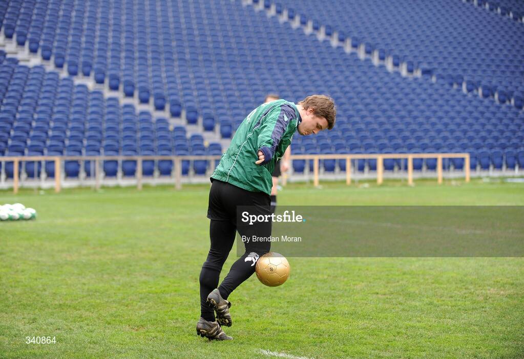10 March 2009; Captain Brian O'Driscoll practices with a golden soccer ball before the start of Ireland rugby squad training. RDS, Dublin. Picture credit: Brendan Moran / SPORTSFILE