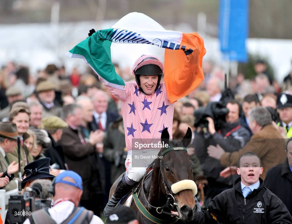10 March 2009; Go Native, with jockey Paul Carberry celebrate after winning the williamhill.com Supreme Novices' Hurdle. Cheltenham Racing Festival - Tuesday, Prestbury Park, Cheltenham, Gloucestershire, England. Picture credit: David Maher / SPORTSFILE