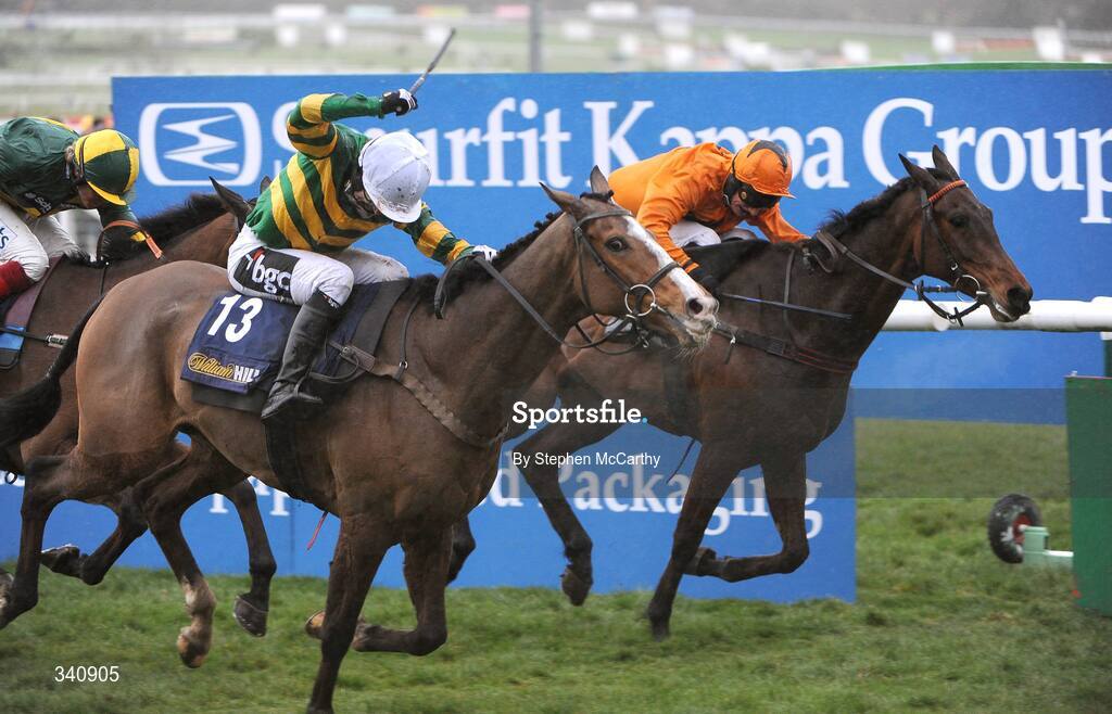 10 March 2009; Wichita Lineman, with Tony McCoy up, comes from behind to win the William Hill Trophy Handicap Chase, from eventual second Maljimar, with Dayrl Jacob up during the Cheltenham Racing Festival at Prestbury Park in Cheltenham, Gloucestershire, England. Photo by Stephen McCarthy/Sportsfile