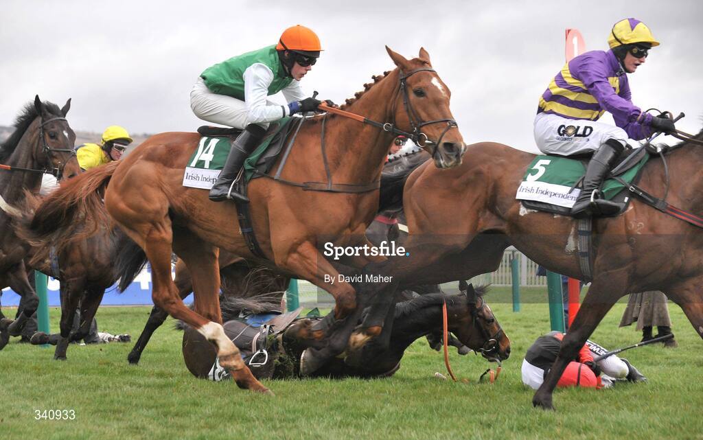 10 March 2009; Jockey Ruby Walsh on the ground after he parted company with Tatenen at the last fence, first time round, during the Irish Independent Arkle Challenge Trophy Chase. Cheltenham Racing Festival, Prestbury Park, Cheltenham, Gloucestershire, England. Picture credit: David Maher / SPORTSFILE