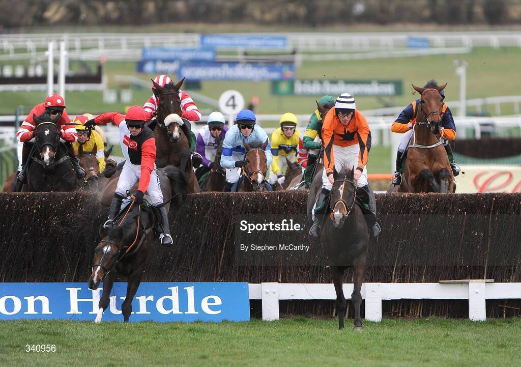 10 March 2009; Race favourite Tatenen unseats rider Ruby Walsh at the third fence during the Irish Independent Arkle Challenge Trophy Chase. Cheltenham Racing Festival, Prestbury Park, Cheltenham, Gloucestershire, England. Picture credit: Stephen McCarthy / SPORTSFILE