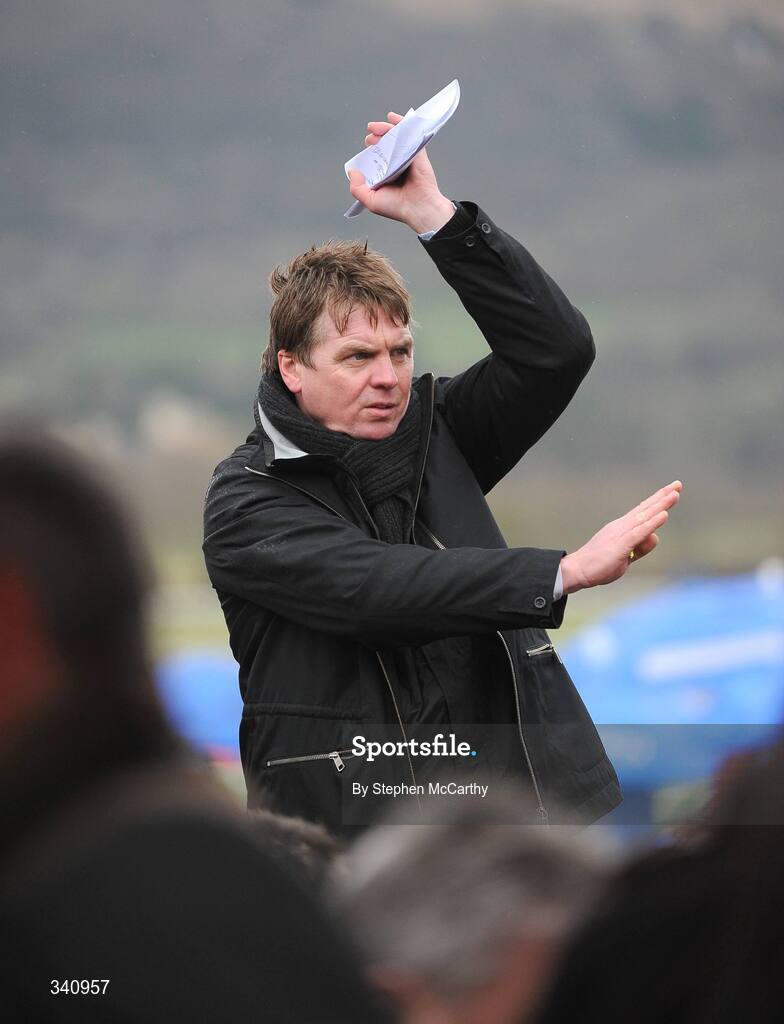 10 March 2009; A bookmaker uses 'tic-tac' to pass information during the opening day of the Chalentham Racing Festival 2009. Cheltenham Racing Festival, Prestbury Park, Cheltenham, Gloucestershire, England. Picture credit: Stephen McCarthy / SPORTSFILE