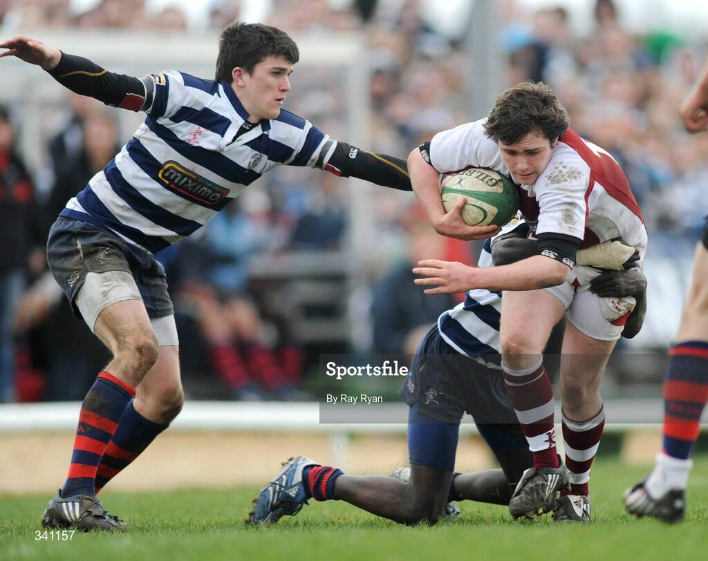 11 March 2009; Anthony O'Loughlin, Colaiste Iognaid, in action against David Butler and Patrick Hazleton, Sligo Grammar School. Connacht Schools Senior Cup Final, Colaiste Iognaid v Sligo Grammar School, Sportsground, Galway. Picture credit: Ray Ryan / SPORTSFILE