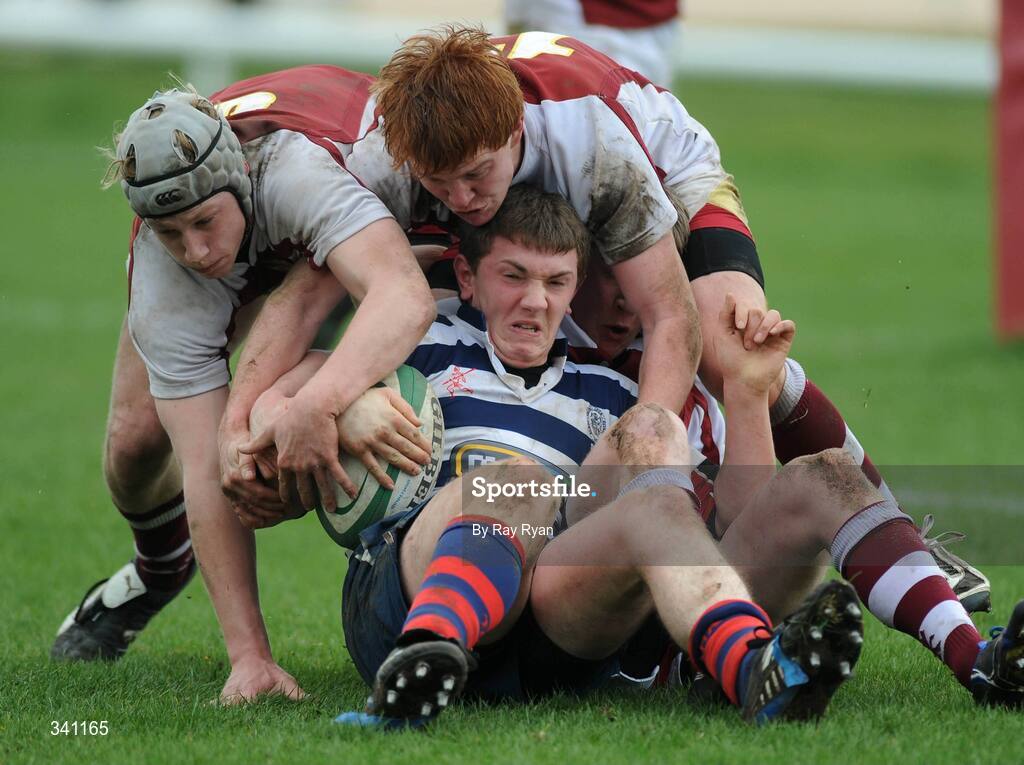 11 March 2009; Aaron Spring, Sligo Grammar School, in action against Aaron Conneely and Colin Conroy, Colaiste Iognaid. Connacht Schools Senior Cup Final, Colaiste Iognaid v Sligo Grammar School, Sportsground, Galway. Picture credit: Ray Ryan / SPORTSFILE