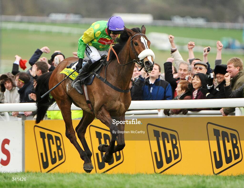 13 March 2009; Kauto Star, with Ruby Walsh up, on their way to winning the totesport Cheltenham Gold Cup Steeple Chase. Cheltenham Racing Festival - Friday. Prestbury Park, Cheltenham, Gloucestershire, England. Picture credit: Stephen McCarthy / SPORTSFILE