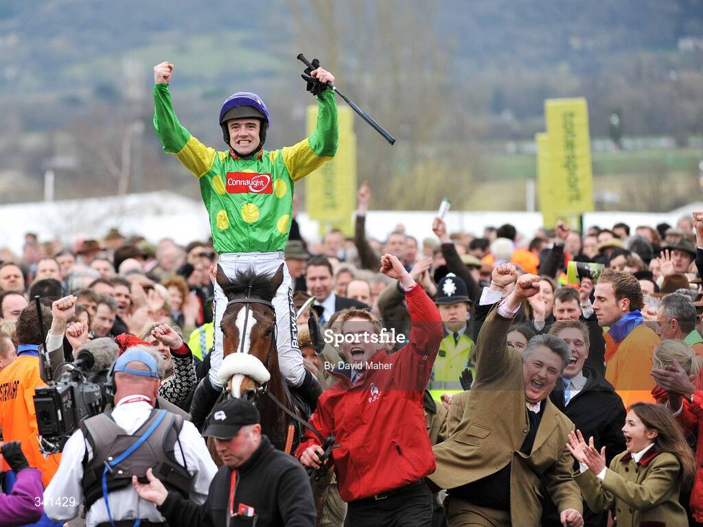 13 March 2009; Jockey Ruby Walsh celebrates with trainer Paul Nicholls, bottom right, after winning the totesport Cheltenham Gold Cup Steeple Chase onboard Kauto Star. Cheltenham Racing Festival - Friday. Prestbury Park, Cheltenham, Gloucestershire, England. Picture credit: David Maher / SPORTSFILE