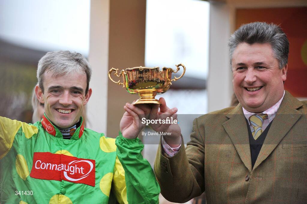 13 March 2009; Jockey Ruby Walsh, left, celebrates with trainer Paul Nicholls, after winning the totesport Cheltenham Gold Cup Steeple Chase on his mount Kauto Star. Cheltenham Racing Festival - Friday. Prestbury Park, Cheltenham, Gloucestershire, England. Picture credit: David Maher / SPORTSFILE