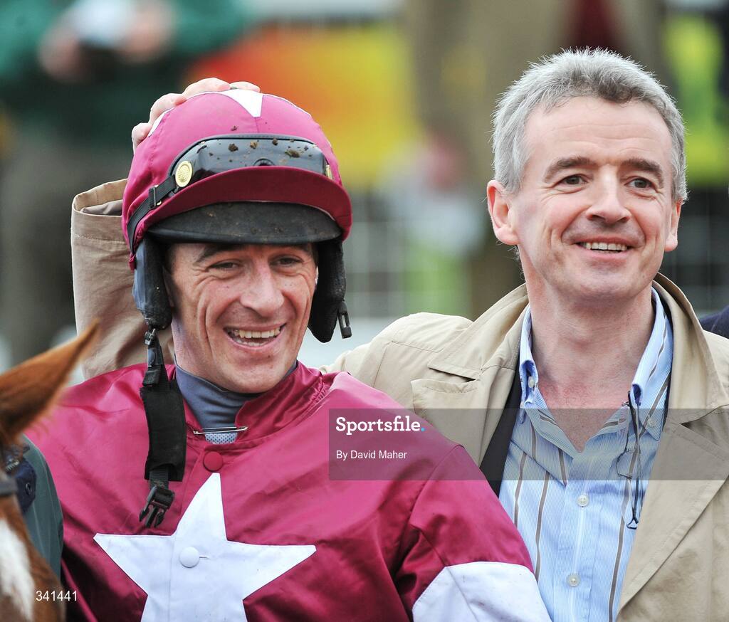 13 March 2009; Jockey Davy Russell, celebrates with Michael O'Leary after winning the Albert Barlett Novices' Hurdle Race onboard Weapon's Amnesty. Cheltenham Racing Festival - Friday. Prestbury Park, Cheltenham, Gloucestershire, England. Picture credit: David Maher / SPORTSFILE