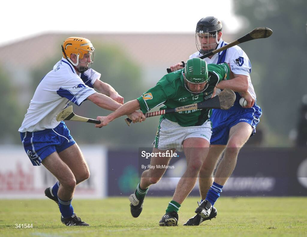 14 March 2009; Eddie Brennan, Leinster, is tackled by Keith Raymond, left, and Brian Burke, Connacht. M Donnelly Interprovincial Hurling Final presented by Etihad Airways, Leinster v Connacht, Ghantoot Racing and Polo Club, Abu Dhabi, United Arab Emirates. Picture credit: Ray McManus / SPORTSFILE