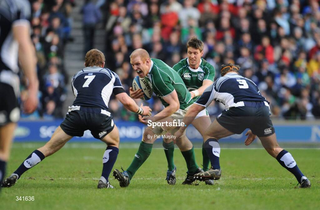 14 March 2009; Paul O'Connell, Ireland, is tackled by John Barclay, left, and James Hamilton, Scotland. RBS Six Nations Championship, Scotland v Ireland, Murrayfield Stadium, Edinburgh, Scotland. Picture credit: Pat Murphy / SPORTSFILE
