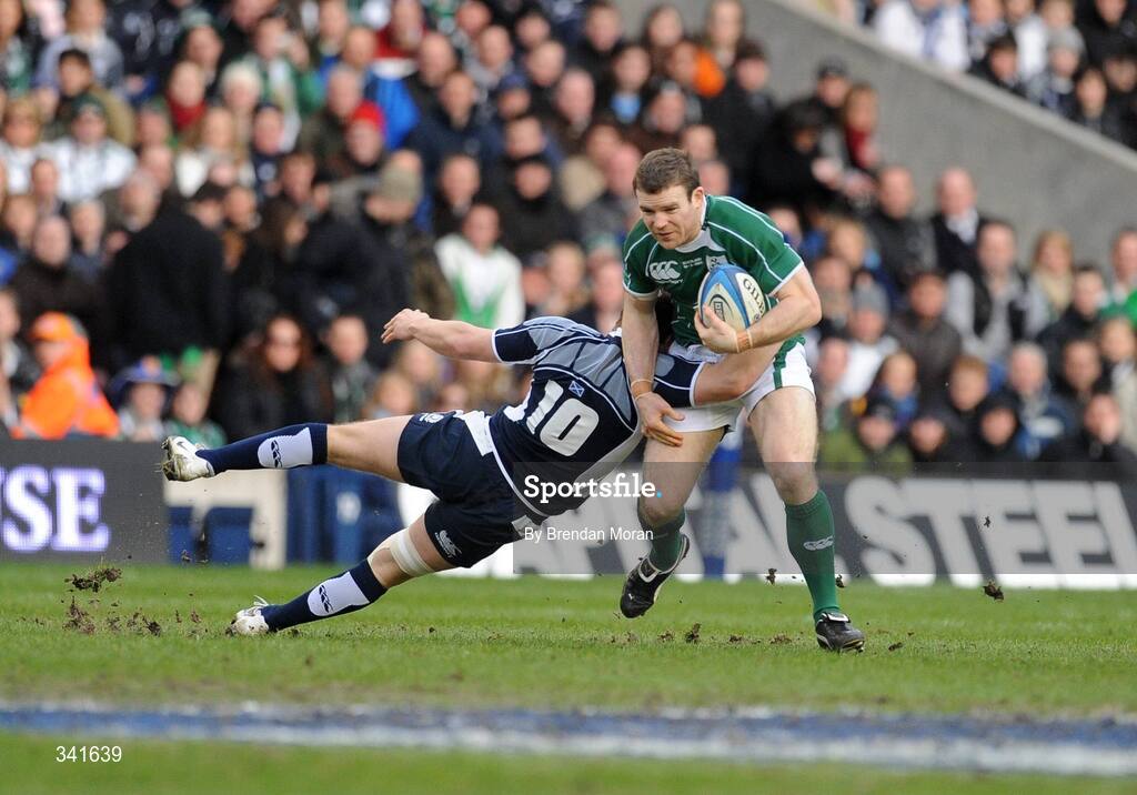 14 March 2009; Gordon D'Arcy, Ireland, is tackled by Phil Godman, Scotland. RBS Six Nations Championship, Scotland v Ireland, Murrayfield Stadium, Edinburgh, Scotland. Picture credit: Brendan Moran / SPORTSFILE