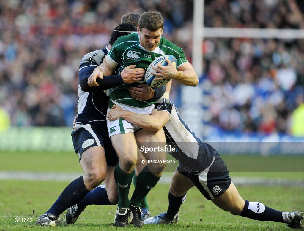 14 March 2009; Gordon D'Arcy, Ireland, is tackled by Alasdair Dickinson, left, and Max Evans, Scotland. RBS Six Nations Championship, Scotland v Ireland, Murrayfield Stadium, Edinburgh, Scotland. Picture credit: Brendan Moran / SPORTSFILE