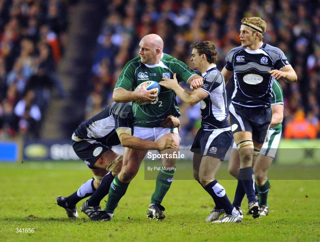 14 March 2009; John Hayes, Ireland, is tackled by James Hamilton, left, and Max Evans, Scotland. RBS Six Nations Championship, Scotland v Ireland, Murrayfield Stadium, Edinburgh, Scotland. Picture credit: Pat Murphy / SPORTSFILE