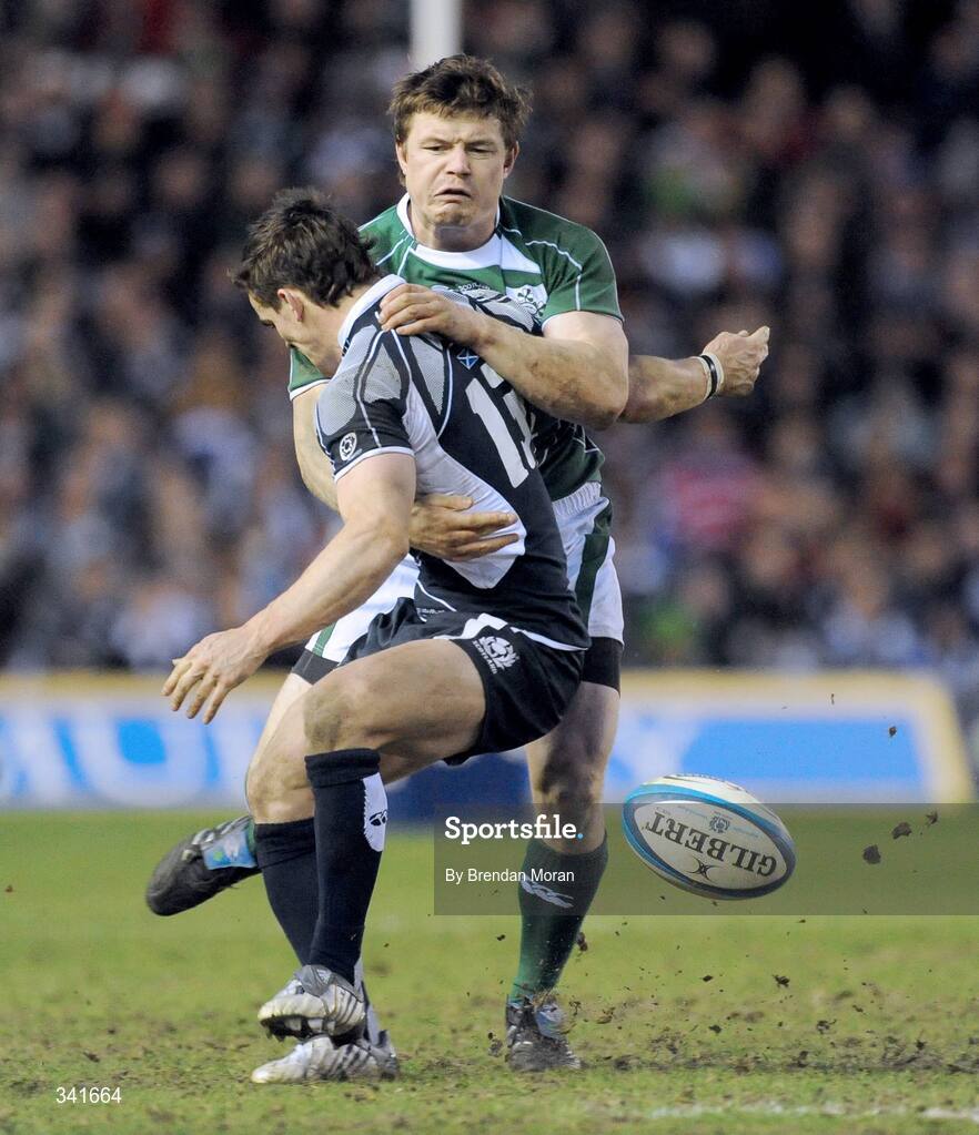 14 March 2009; Brian O'Driscoll, Ireland, loses possession while being tackled by Max Evans, Scotland. RBS Six Nations Championship, Scotland v Ireland, Murrayfield Stadium, Edinburgh, Scotland. Picture credit: Brendan Moran / SPORTSFILE