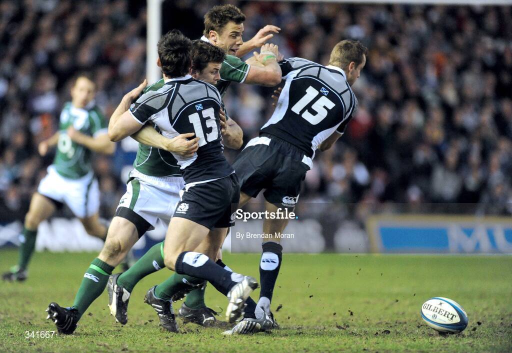 14 March 2009; Brian O'Driscoll and Tommy Bowe, Ireland, attempt to get onto a loose ball as Max Evans, 13, and Chris Paterson, Scotland, get in the way. RBS Six Nations Championship, Scotland v Ireland, Murrayfield Stadium, Edinburgh, Scotland. Picture credit: Brendan Moran / SPORTSFILE