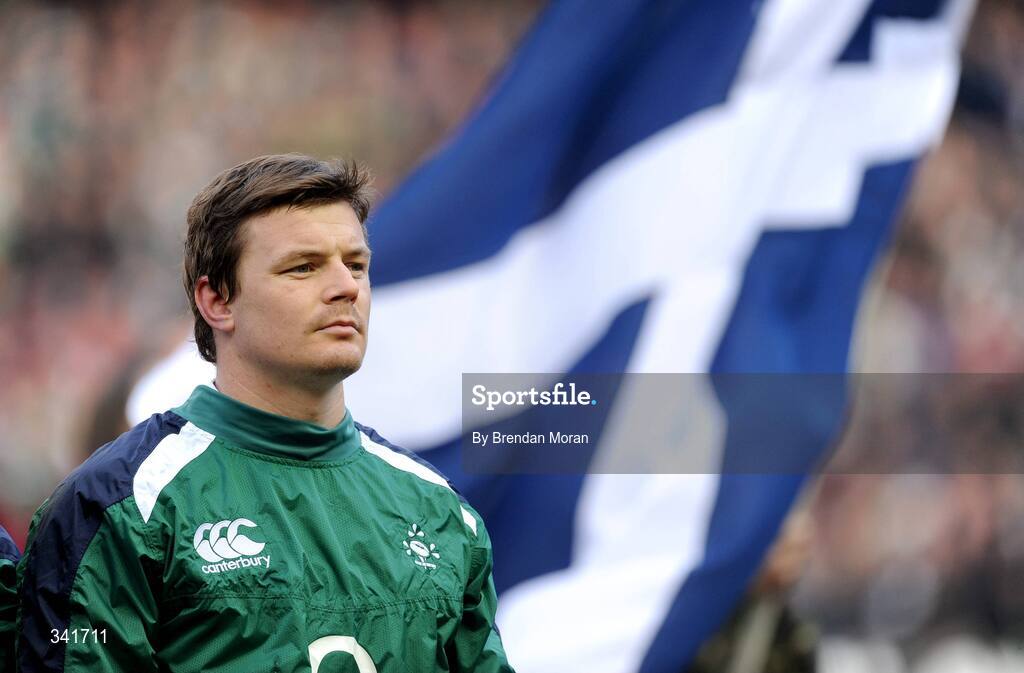 14 March 2009; Ireland captain Brian O'Driscoll stands for the national anthems as a Scottish flag waves in the background. RBS Six Nations Championship, Scotland v Ireland, Murrayfield Stadium, Edinburgh, Scotland. Picture credit: Brendan Moran / SPORTSFILE