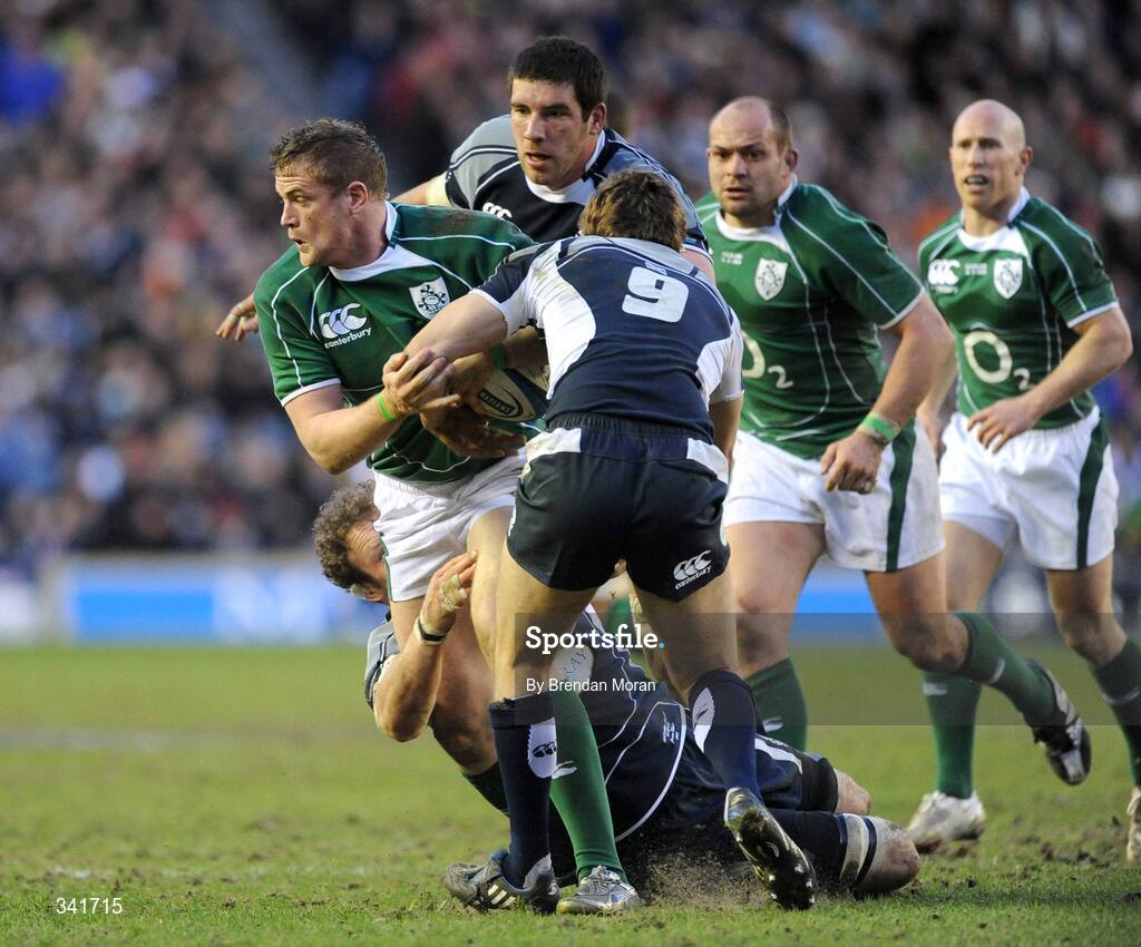 14 March 2009; Jamie Heaslip, Ireland, is tackled by Jason White, left, and Mike Blair, Scotland. RBS Six Nations Championship, Scotland v Ireland, Murrayfield Stadium, Edinburgh, Scotland. Picture credit: Brendan Moran / SPORTSFILE