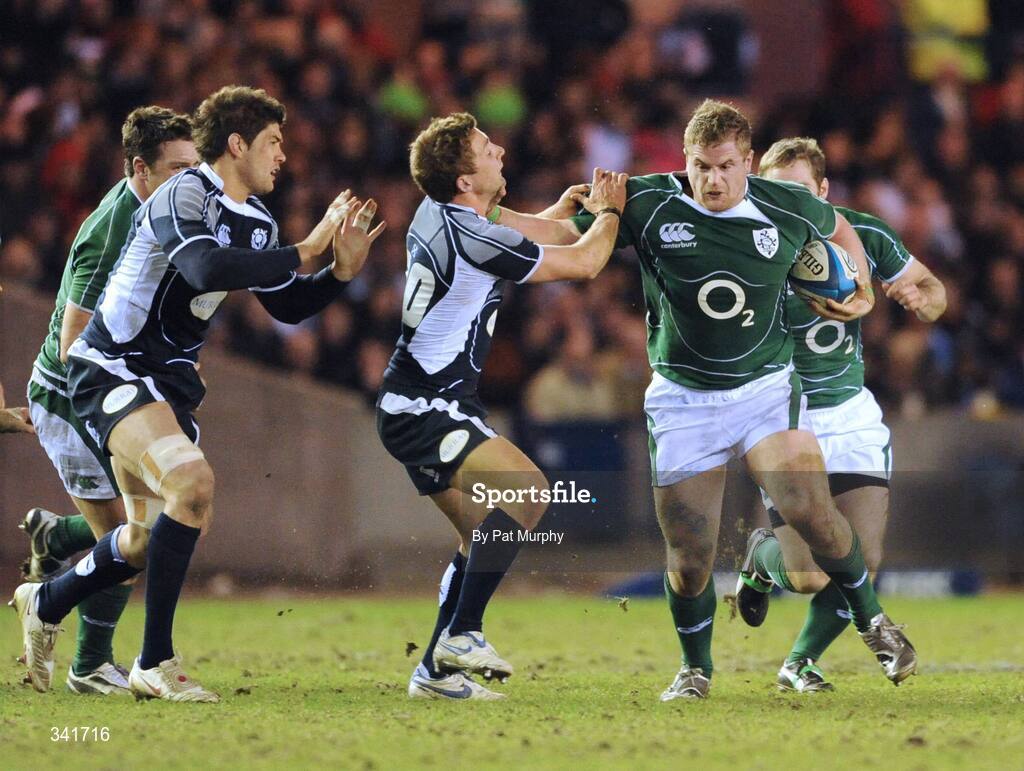 14 March 2009; Jamie Heaslip, Ireland, holds off the challenge of Chris Cusiter, Scotland. RBS Six Nations Championship, Scotland v Ireland, Murrayfield Stadium, Edinburgh, Scotland. Picture credit: Pat Murphy / SPORTSFILE