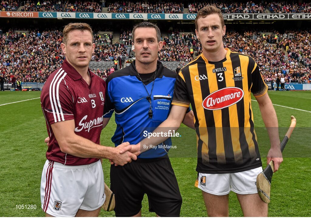 6 September 2015; Andrew Smith, Galway, and Joey Holden, Kilkenny, shake hands in the company of referee James Owens. GAA Hurling All-Ireland Senior Championship Final, Kilkenny v Galway, Croke Park, Dublin. Picture credit: Ray McManus / SPORTSFILE