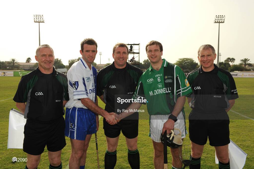 14 March 2009; Captains Andy Coen, left, Connacht, and JJ Delaney, Leinster, shake hands accross referee Michael Wadding before the game. The linesmen are Ger Devlin, Armagh, and Ger Hoey, Clare.  M Donnelly Interprovincial Hurling Final presented by Etihad Airways, Leinster v Connacht, Ghantoot Racing and Polo Club, Abu Dhabi, United Arab Emirates. Picture credit: Ray McManus / SPORTSFILE