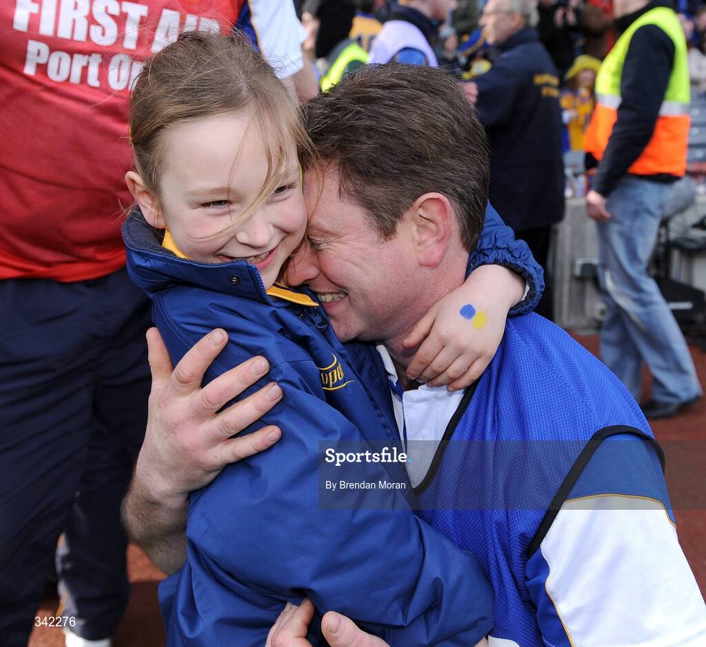 17 March 2009; Portumna manager Johnny Kelly celebrates with his daughter Alannah after the final whistle. AIB All-Ireland Senior Club Hurling Championship Final, Portumna, Co. Galway v De La Salle, Waterford, Croke Park, Dublin. Picture credit: Brendan Moran / SPORTSFILE