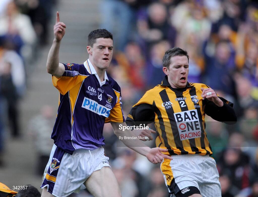 17 March 2009; Mark Davoren, Kilmacud Crokes, celebrates scoring his side's first goal despite the attentions of Brendan McKeown, Crossmaglen Rangers. AIB All-Ireland Senior Club Football Championship Final, Crossmaglen Rangers, Co. Armagh v Kilmacud Croke, Dublin. Croke Park, Dublin. Picture credit: Brendan Moran / SPORTSFILE