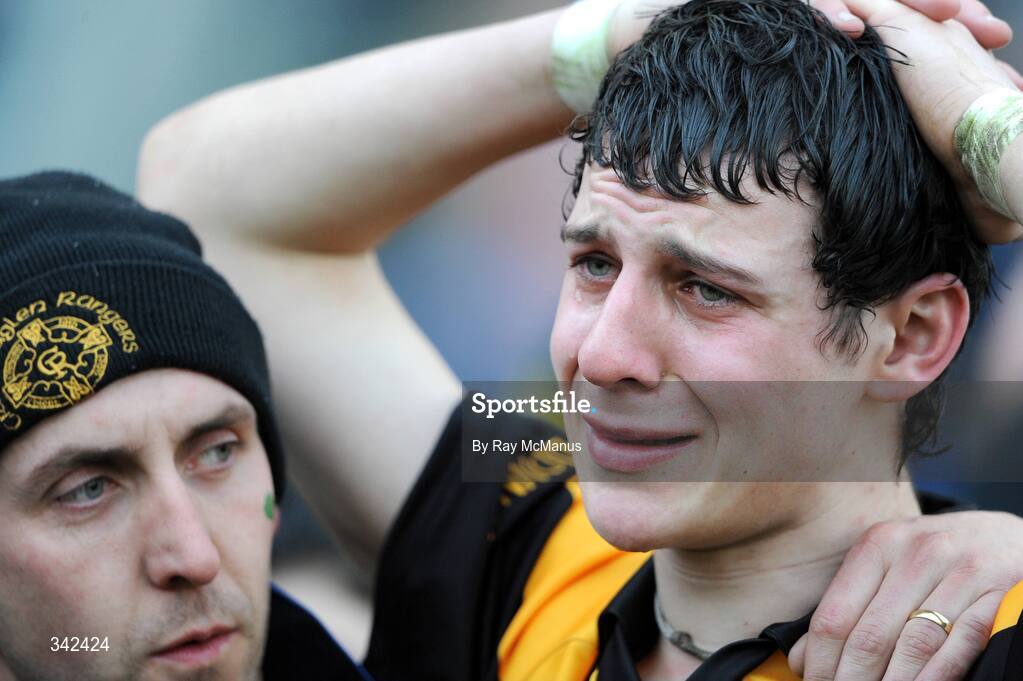17 March 2009; Jamie Clarke, Crossmaglen Rangers, is comforted by club-mate Sean McMahon after the game. AIB All-Ireland Senior Club Football Championship Final, Crossmaglen Rangers, Co. Armagh, v Kilmacud Crokes, Dublin. Croke Park, Dublin. Picture credit: Ray McManus / SPORTSFILE