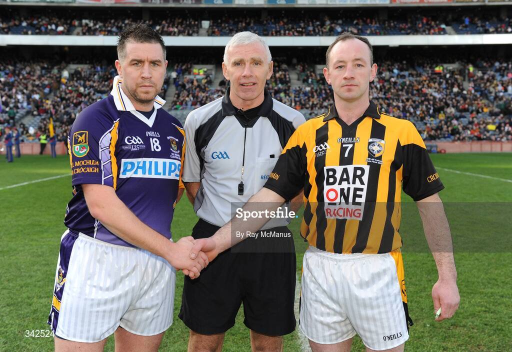 17 March 2009; The Kilmacud Crokes captain Johnny Magee and the Crossmaglen Rangers captain John Donaldson with referee Gearoid O Conamha before the 'toss'. AIB All-Ireland Senior Club Football Championship Final, Crossmaglen Rangers, Co Armagh,  v Kilmacud Crokes, Dublin. Croke Park, Dublin. Picture credit: Ray McManus / SPORTSFILE