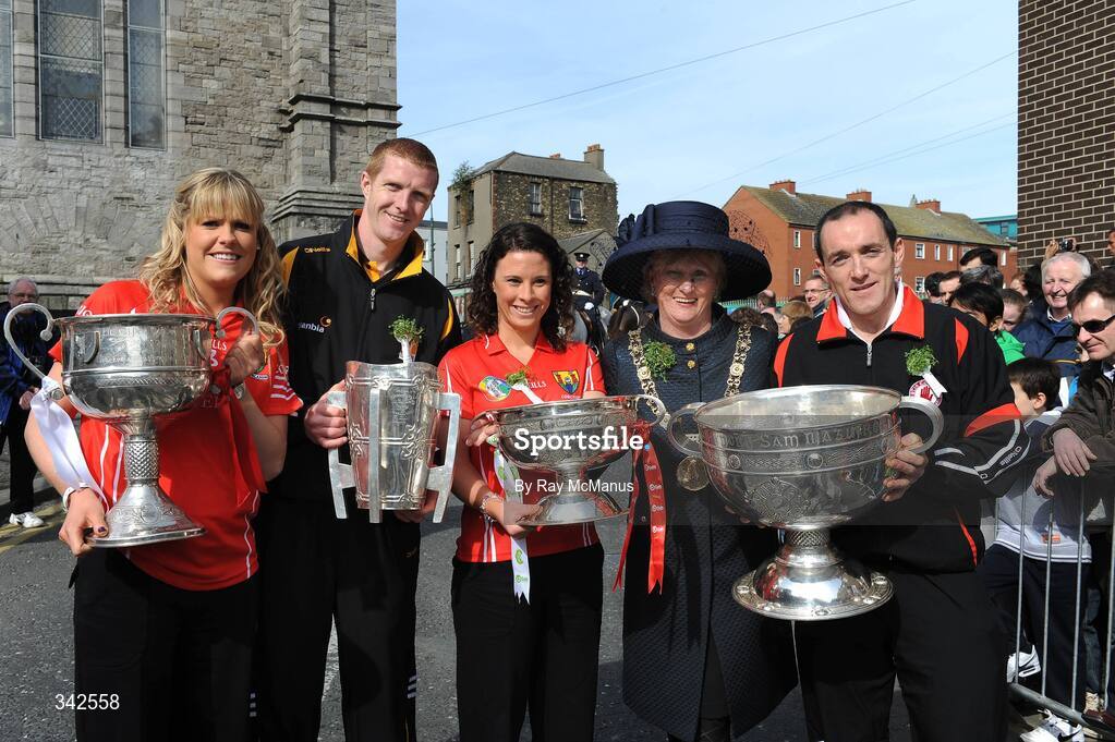 17 March 2009; The Lord Mayor of Dublin Councillor Eibhlin Byrne, second from right, with the four All-Ireland Senior Championship winning captains, from left to right, Angela Walsh, Cork, with the Brendan Martin Cup, Henry Shefflin, Kilkenny, with the Liam MacCarthy Cup, Caitriona Foley, Cork, with the O'Duffy Cup, and Brian Dooher, Tyrone, with the Sam Maguire Cup as part of the 'Monumental Moments’ from the St. Patrick’s Day Parade, part of the GAA's 125th Anniversary. AIB All-Ireland Senior Club Football Championship Final, St Mary's Place, Dublin. Picture credit: Ray McManus / SPORTSFILE